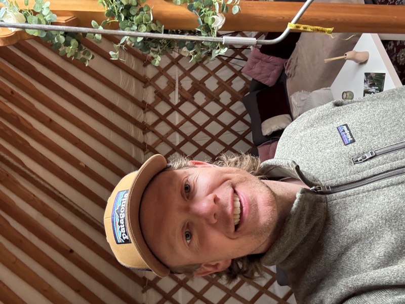 The author, smiling in the yurt
